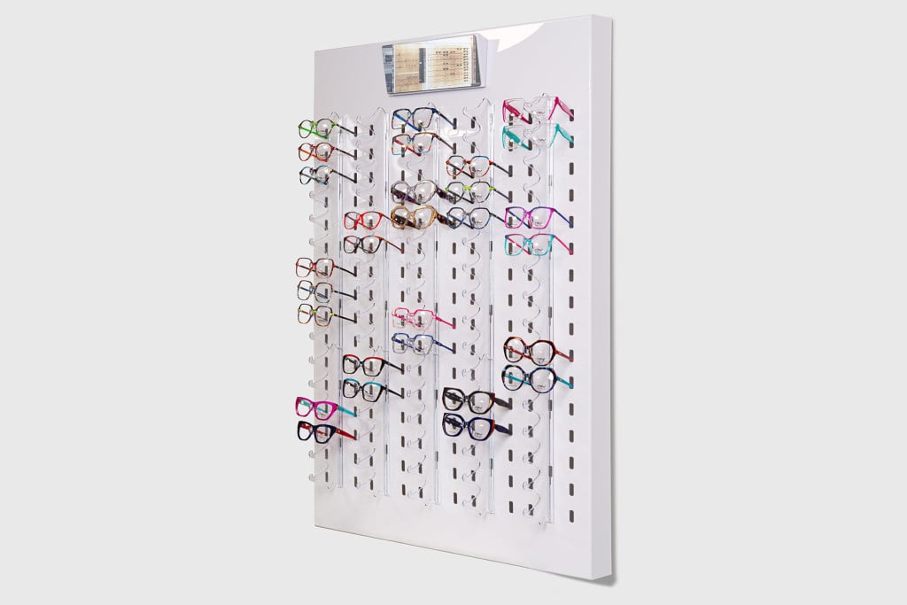 White acrylic wall display for 80 items