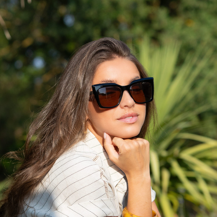 Sunglasses injected woman