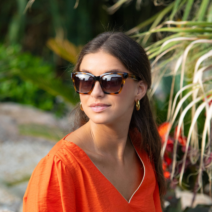 Sunglasses injected woman